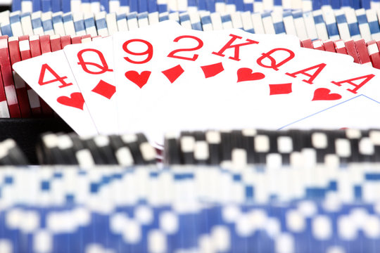 close up playing cards and chips