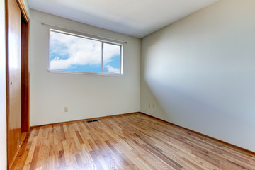 Empty room interior with wood floor.