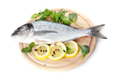 Fresh fish with lemon, parsley and spice