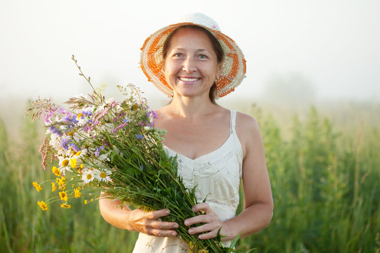 Mature Woman With Flowers Posy