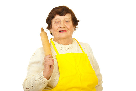 Smiling Elderly Holding Rolling Pin