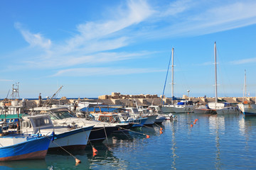 Fototapeta premium White sailboats in the port