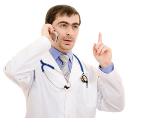 Fototapeta premium Male doctor talking on the phone on a white background.