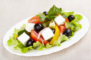 Greek salad on white plate