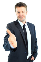 Business man saying welcome and giving hand