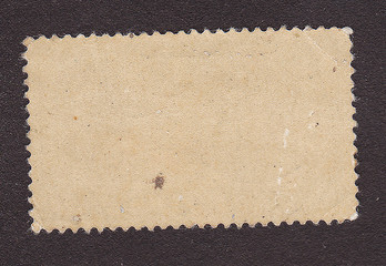 Fototapeta premium Old postage stamp border on black