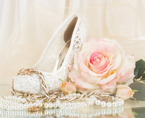 bridal rose with wedding shoe and beads