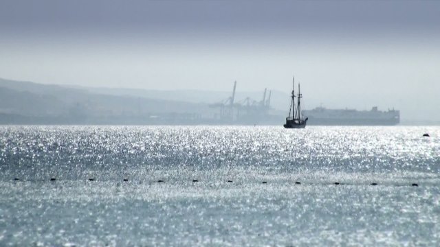mast ship sailing away