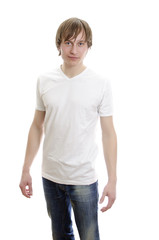 Casual young man in white t-shirt with jeans. Isolated on white.