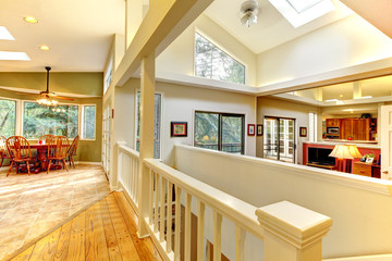 Large bright home interior with hallway.