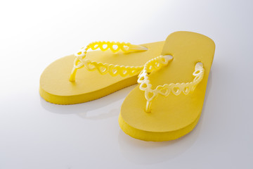 yellow beach sandals isolated on white bright background