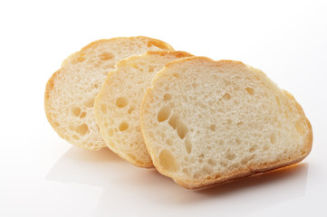 cut baguettes on white background