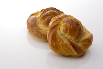 cream sweet roll on white background