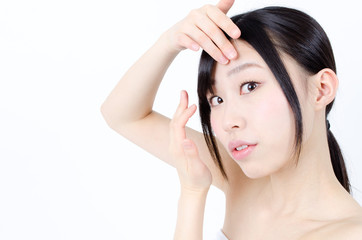 Naklejka premium attractive asian woman skin care image