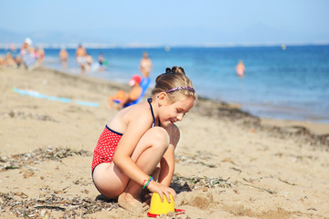 Child playing on the beach