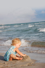 child playing on beach