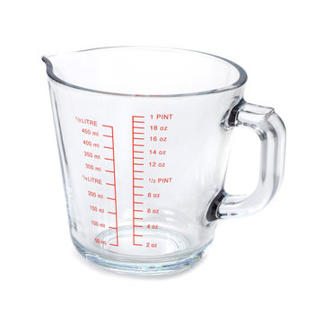 Empty measuring cup isolated on white background