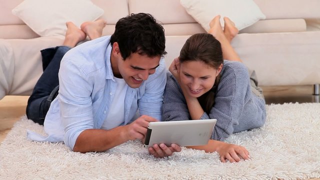 Couple using an tablet PC