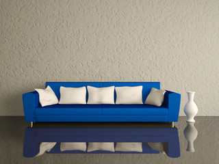 Blue sofa with white pillows