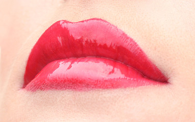 beautiful make up of glamour red gloss lips