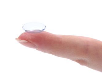 contact lens on finger isolated on white