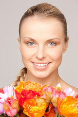Fototapeta premium lovely woman with red flowers