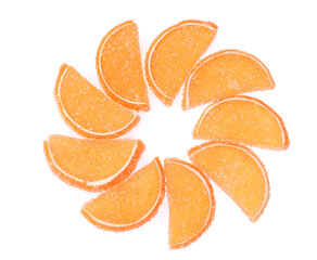 orange jelly candies isolated on white
