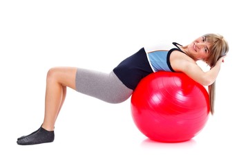 Stretching on pilates ball