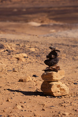 stacked stones in Black Desert in Sahara, western Egypt