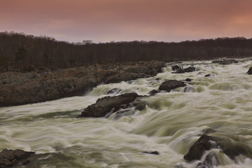 White water river and stormy sky