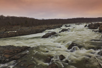 White water river and stormy sky