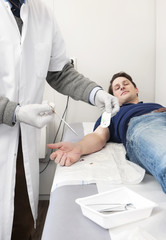 Obraz premium Stitching Up a Wound