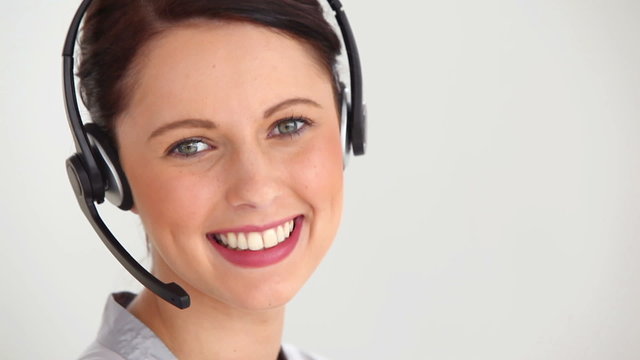 Woman well-dressed wearing headset