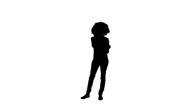 Silhouette woman standing on her own