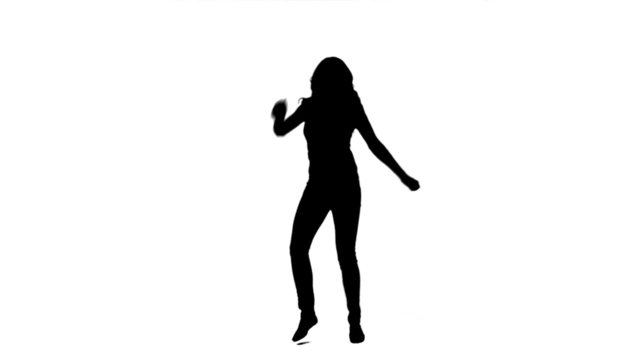 A silhouette dancing woman