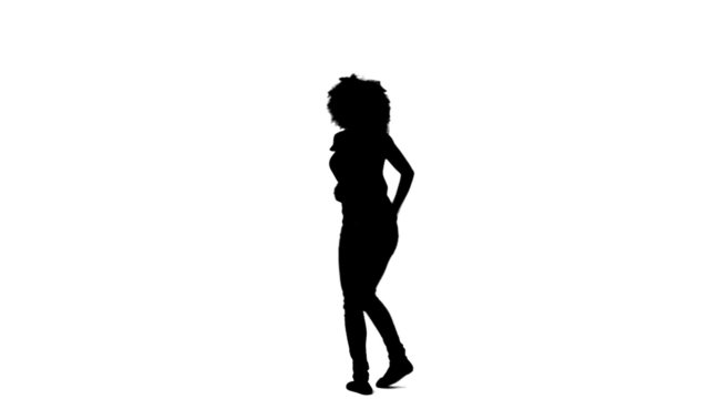 Silhouette woman casually dancing