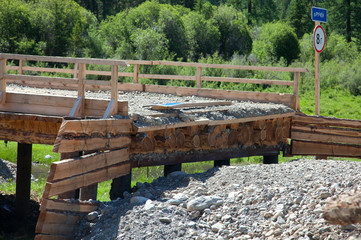 Fototapeta na wymiar Construction of wooden bridge