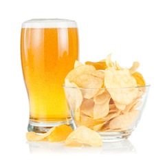 Glass of Fresh Beer and bowl of with Pile potato chips on a whit