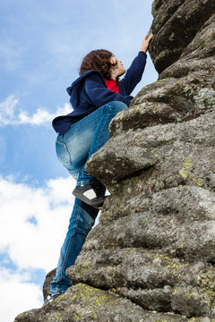 Girl climbing mountains