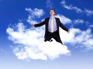 Businessman in suit praying for success