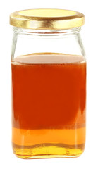 Fresh honey in a glass jar
