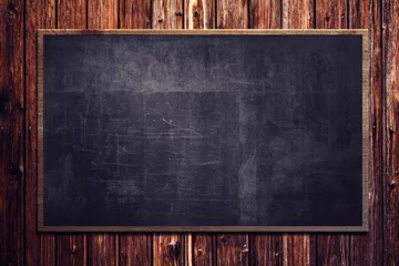 Foto op Plexiglas Blackboard on wooden Wall © lassedesignen