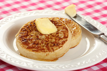 Teatime treat of crumpets and butter