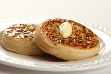 Teatime treat of crumpets and butter