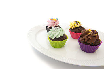 Cupcakes on dish. Copyspace