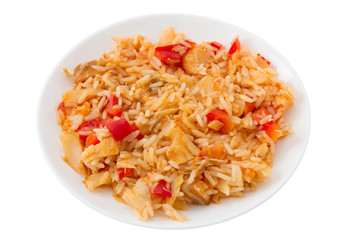 rice with codfish and vegetables on the plate