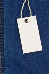 price tag over jeans background