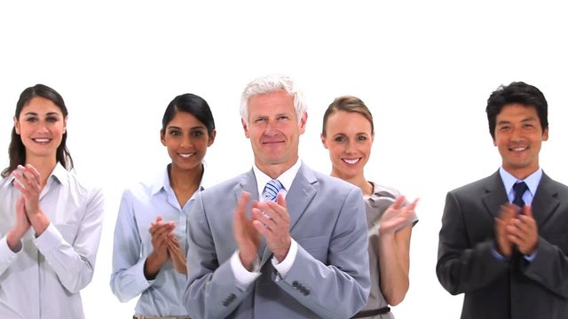 Business team applauding together