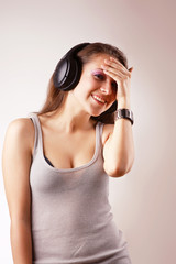 Girl listening music in headphones