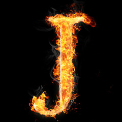Fototapeta premium Fonts and symbols in fire on black - J